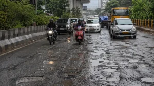 How Rainfall and Potholes Combine to Slow Hyderabad Traffic in Hyderabad
